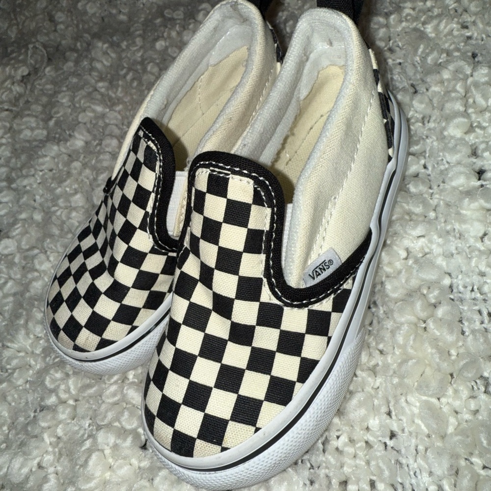Vans Black and White Checkerboard Slip-On Sneakers